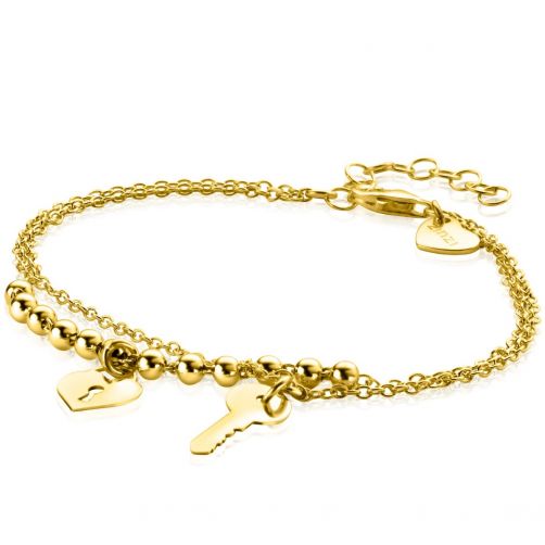 open haard tekort B olie ZINZI gold plated zilveren multi-look armband met bolletjes schakel,  glanzende sleutel en hart als bedels