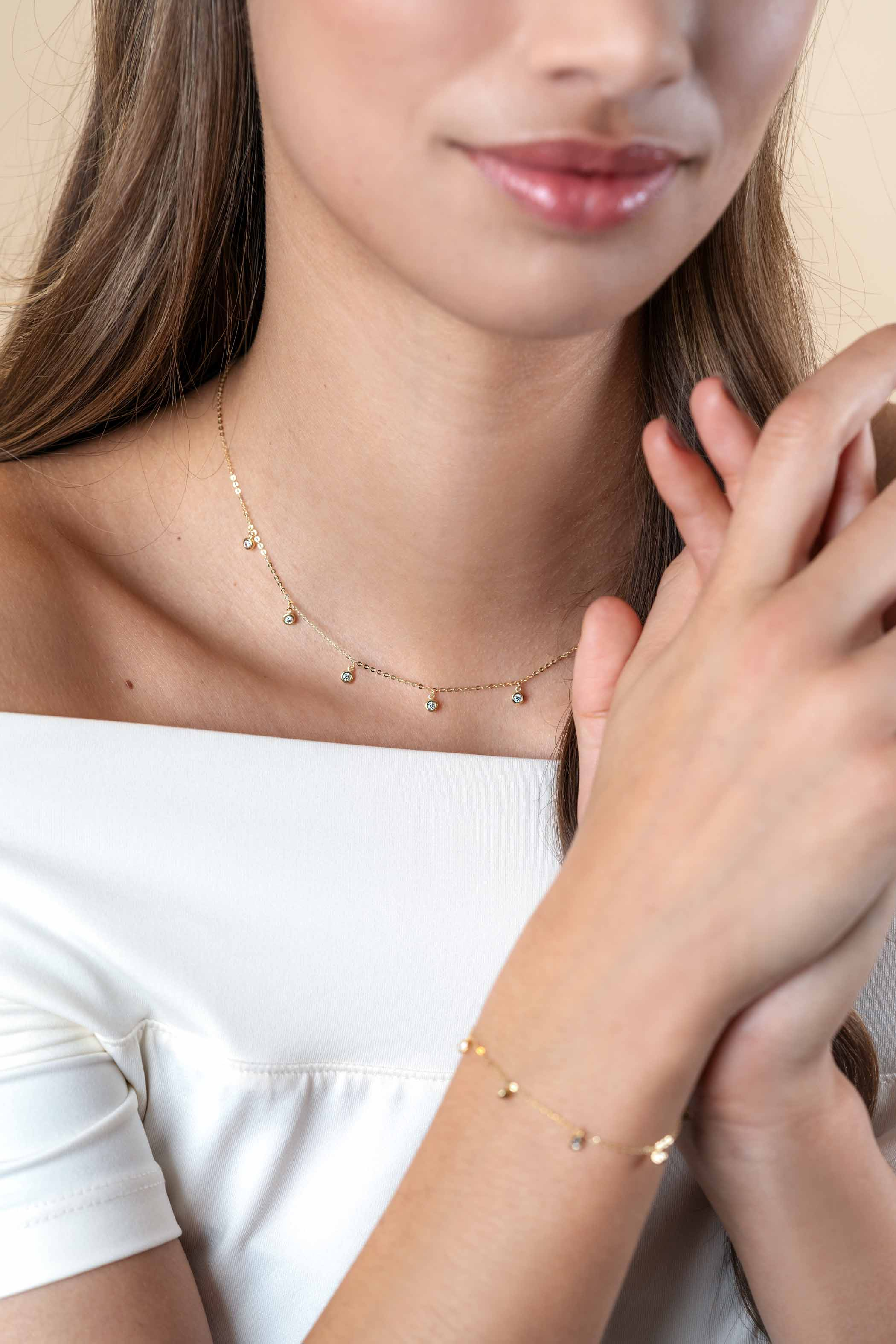 ZINZI Gold 14 krt gouden anker ketting met zeven ronde hangertjes, bezet met witte zirconia's 40-43cm ZGC451
