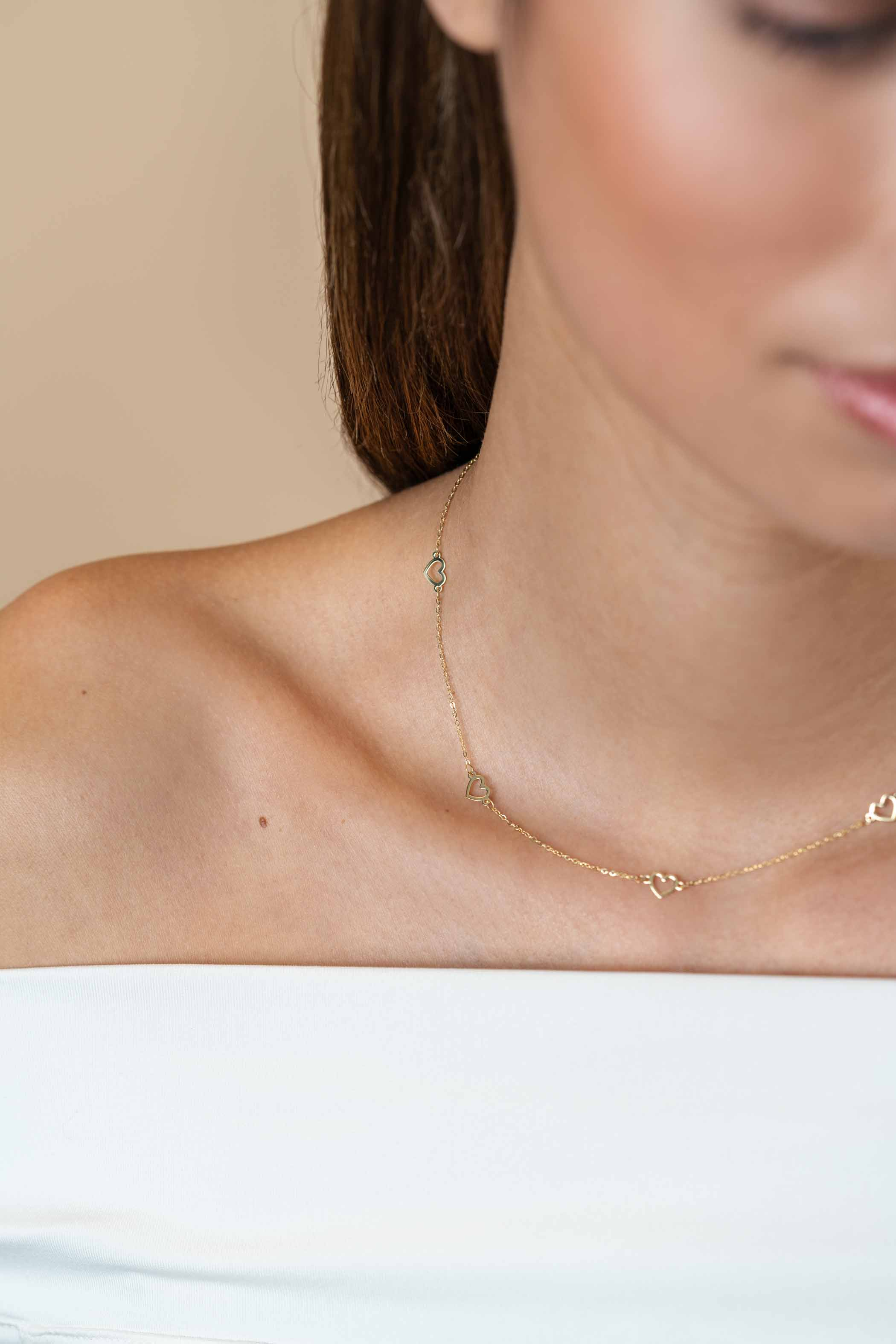 ZINZI Gold 14 krt gouden ketting met subtiele jasseron schakels en vijf open hartjes 5mm breed 42-45cm ZGC504