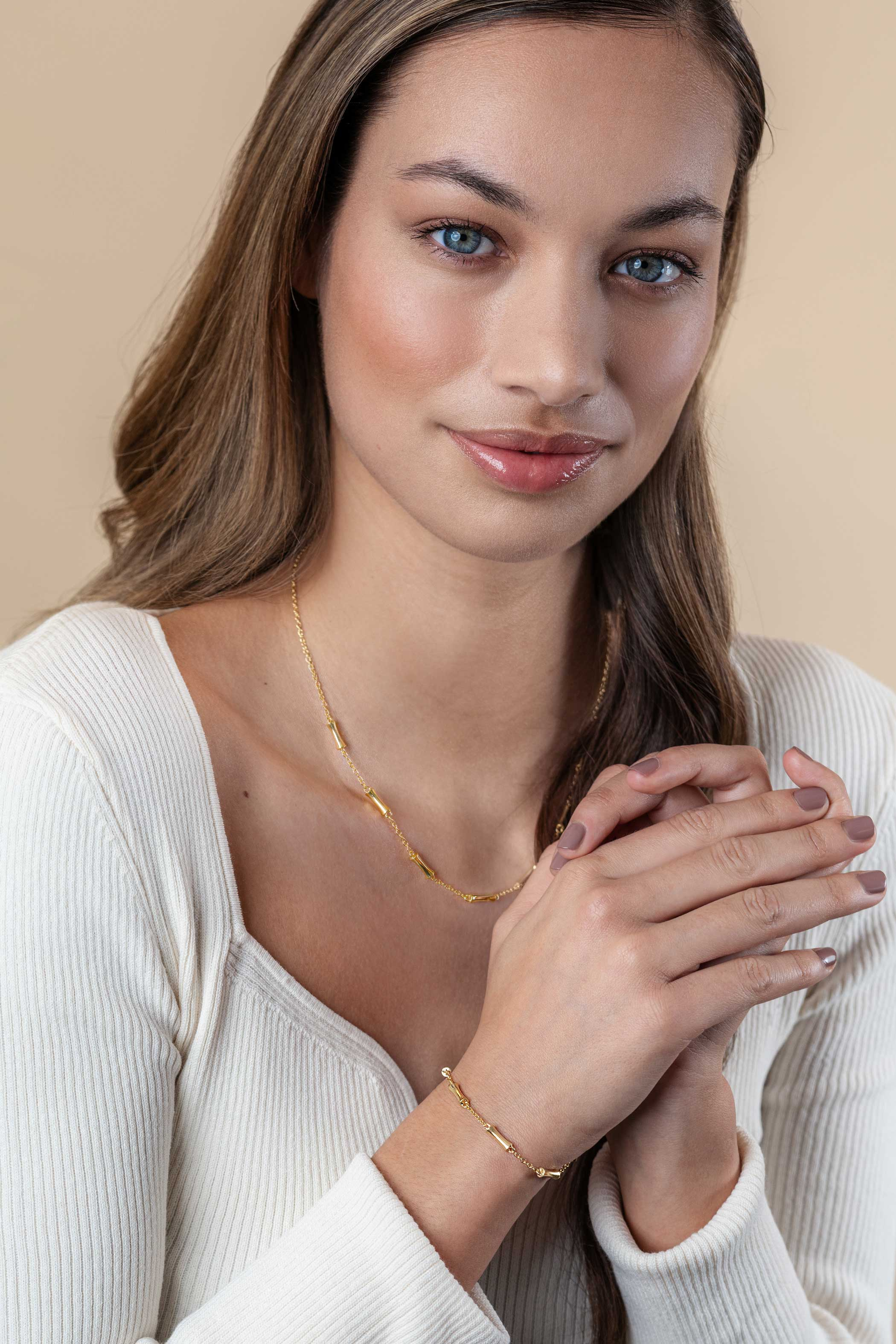 ZINZI gold plated zilveren schakel ketting met zeven gladde bamboe vormen 40-45m ZIC2577G
