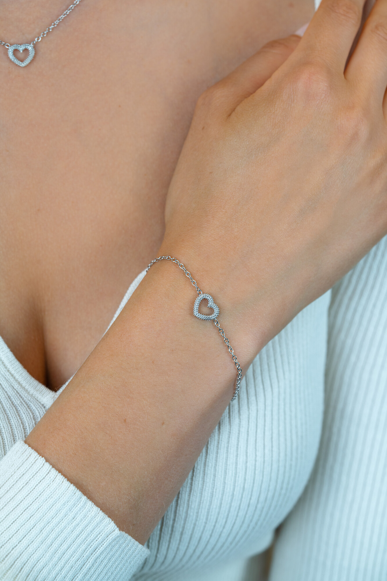 ZINZI zilveren armband met open hartje (9,5mm) voorzien van een bolstructuur 17-20cm ZIA2703