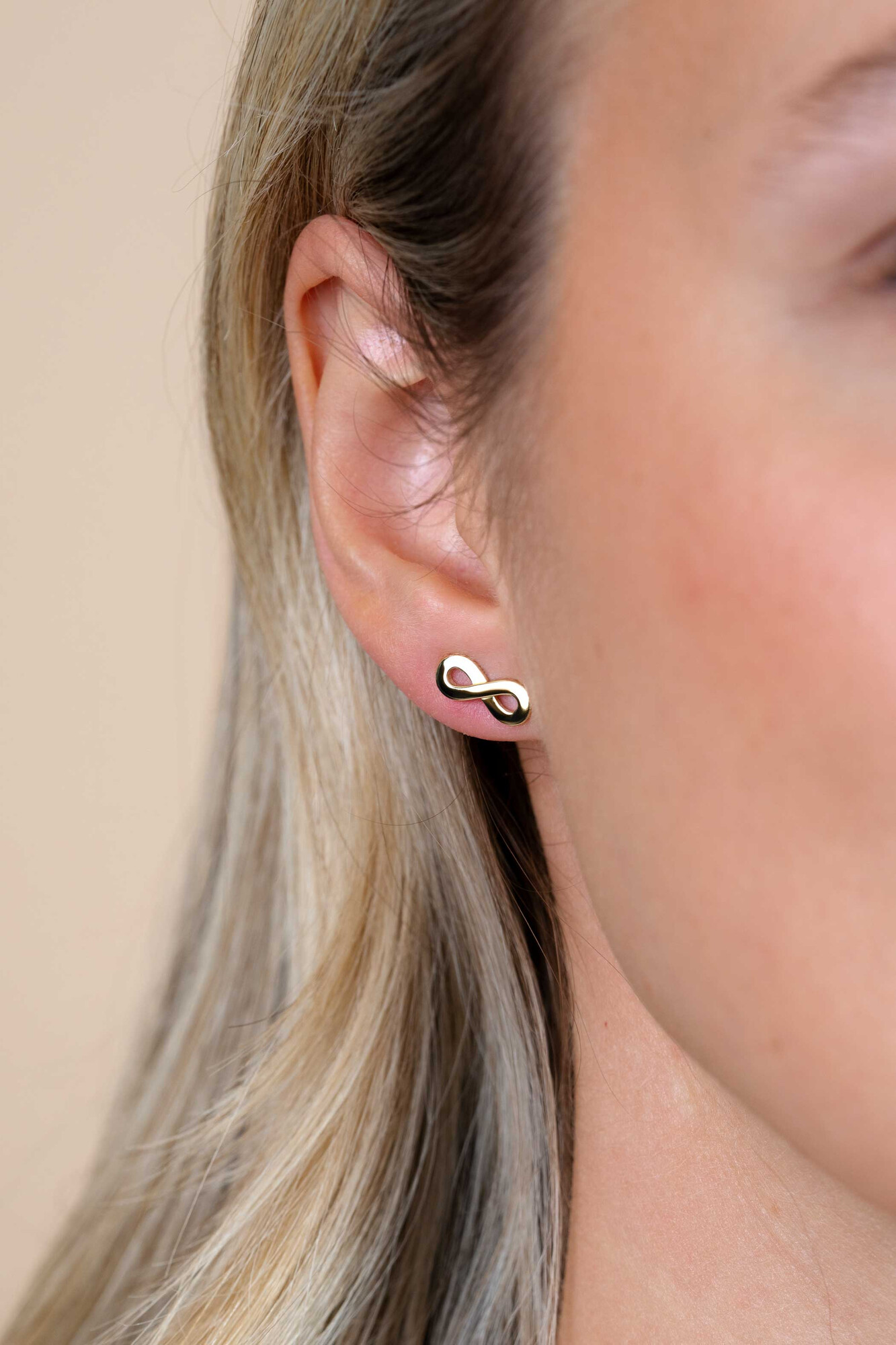 ZINZI zilveren geelgoudvergulde oorknoppen infinity ZIO1065G