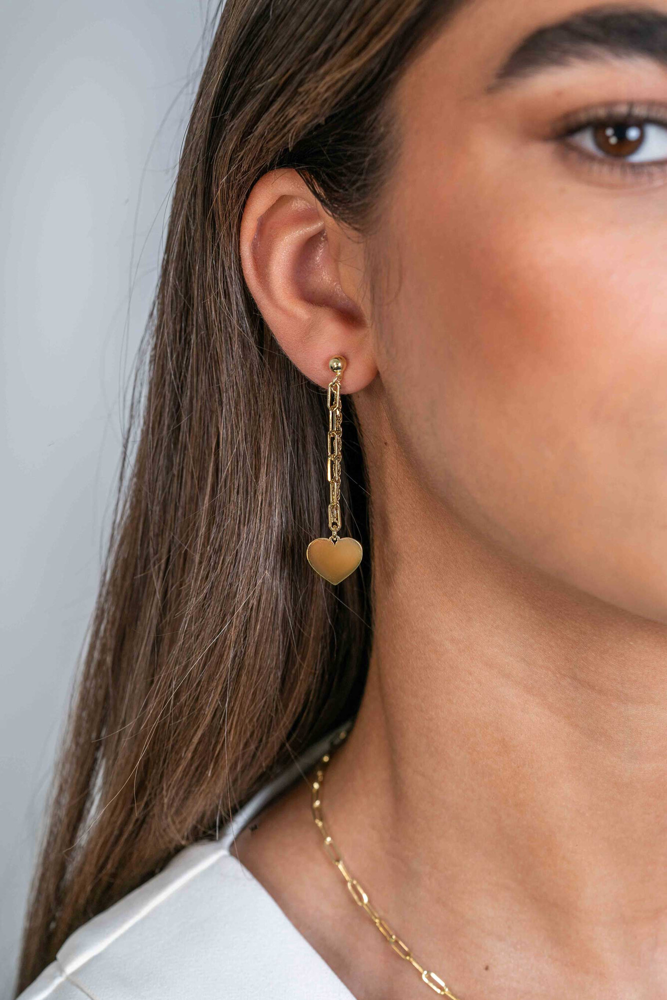 ZINZI gold plated zilveren oorstekers 52mm lang met twee trendy schakels en glad hart ZIO2381G
