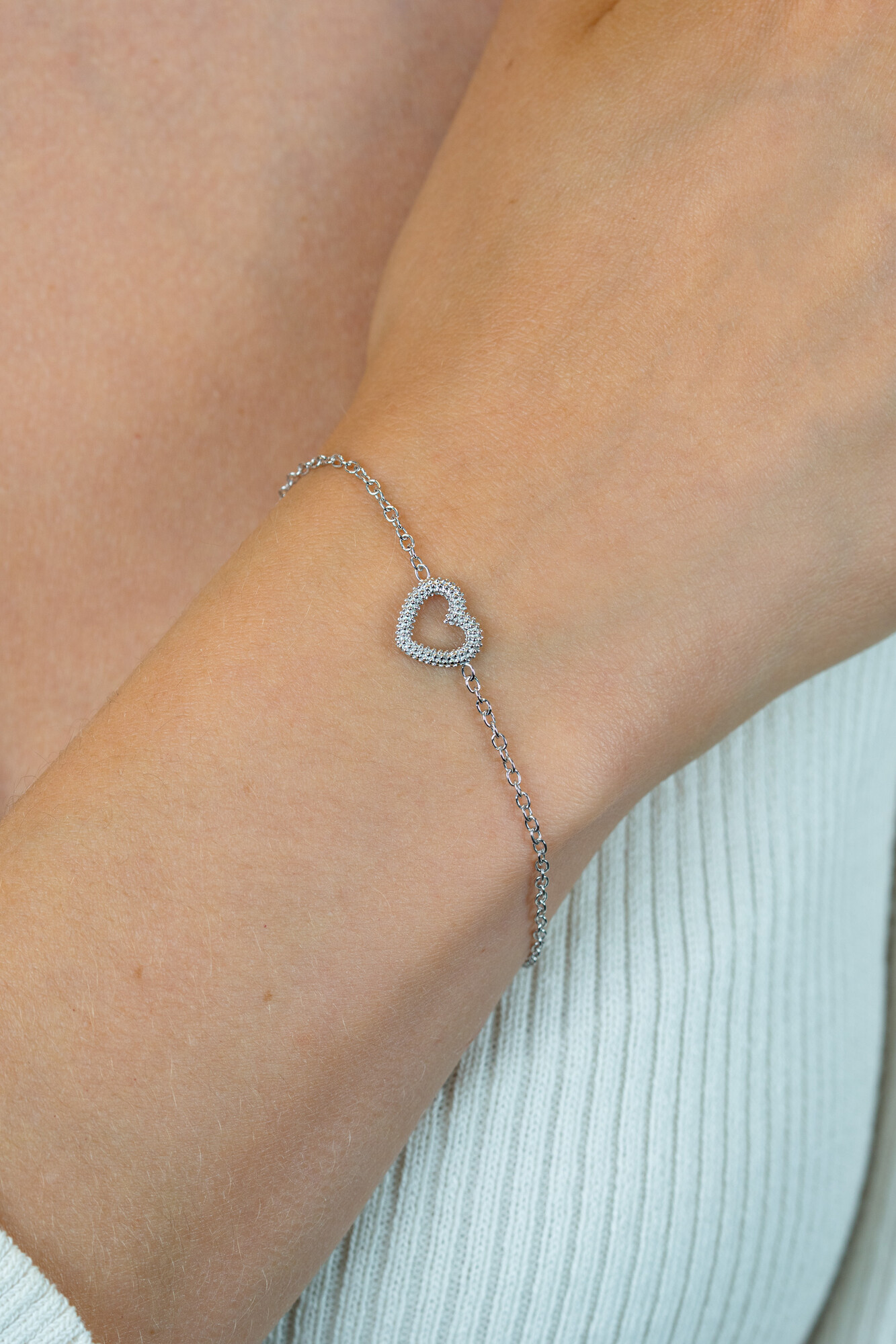 ZINZI zilveren armband met open hartje (9,5mm) voorzien van een bolstructuur 17-20cm ZIA2703
