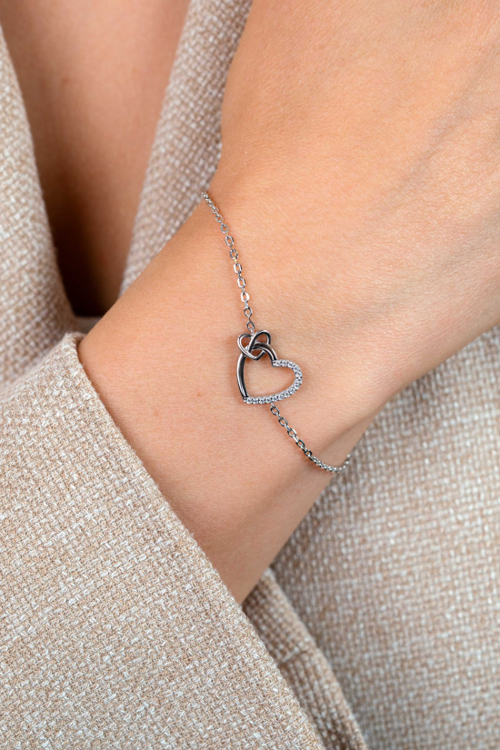 ZINZI zilveren armband met twee sierlijke harten die met elkaar verbonden zijn, ook bezet met witte zirkonia's 17-20cm ZIA2874