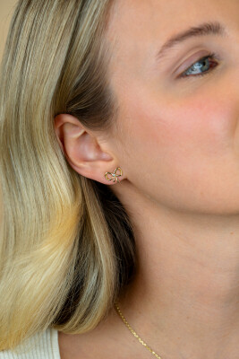 9,5mm ZINZI gold plated zilveren oorstekers strikje met zirkonia ZIO2724Y