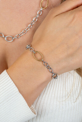 ZINZI bicolor zilveren schakelarmband met drie ovale goldplated schakels ZIA2785